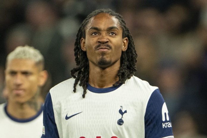 djed-spence-leaves-pedro-porro-rolling-on-floor-after-crunching-tackle-in-tottenham-training